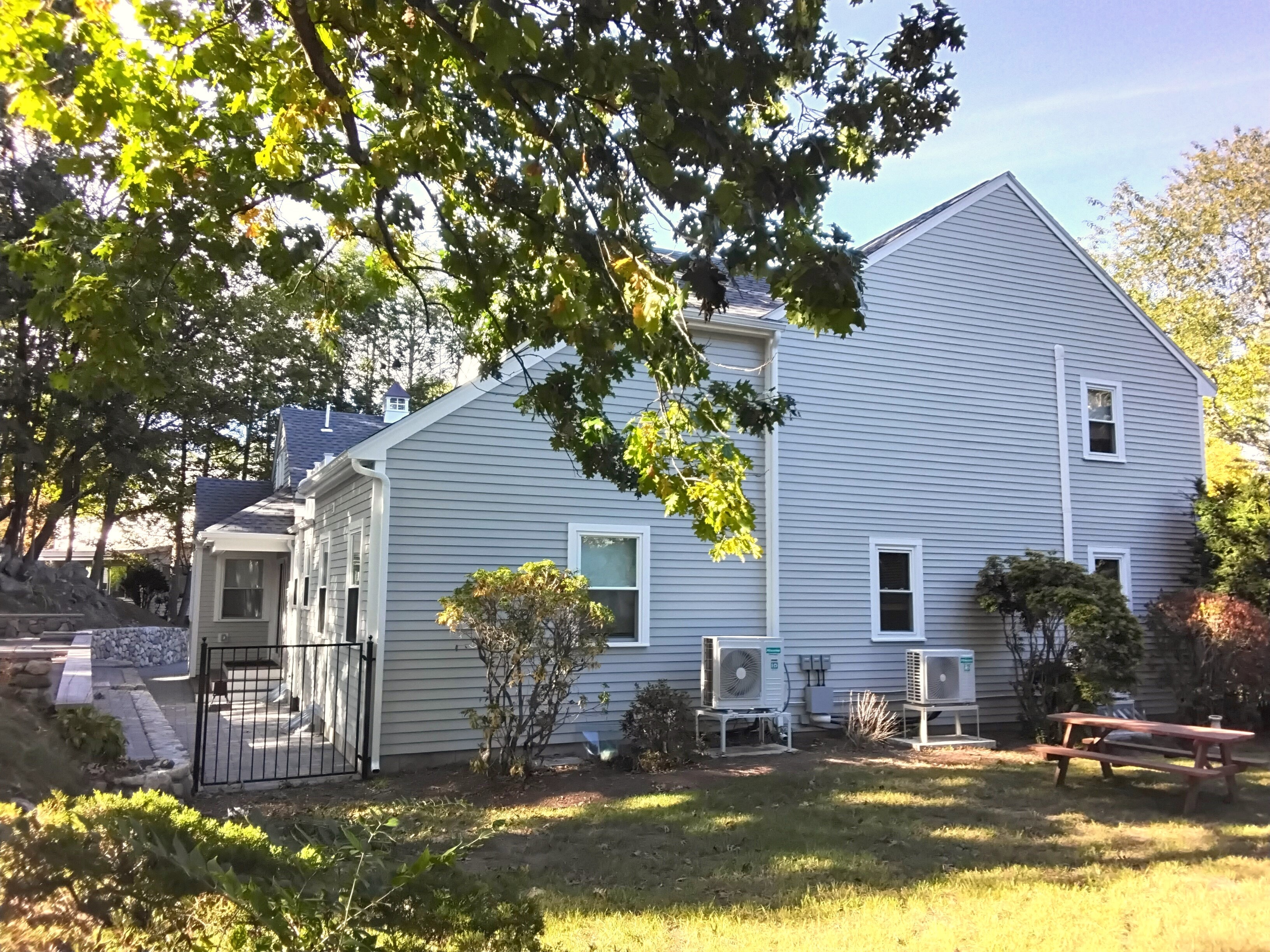Colonial Home, Lexington — view with full-length addition to the left and existing house to the right