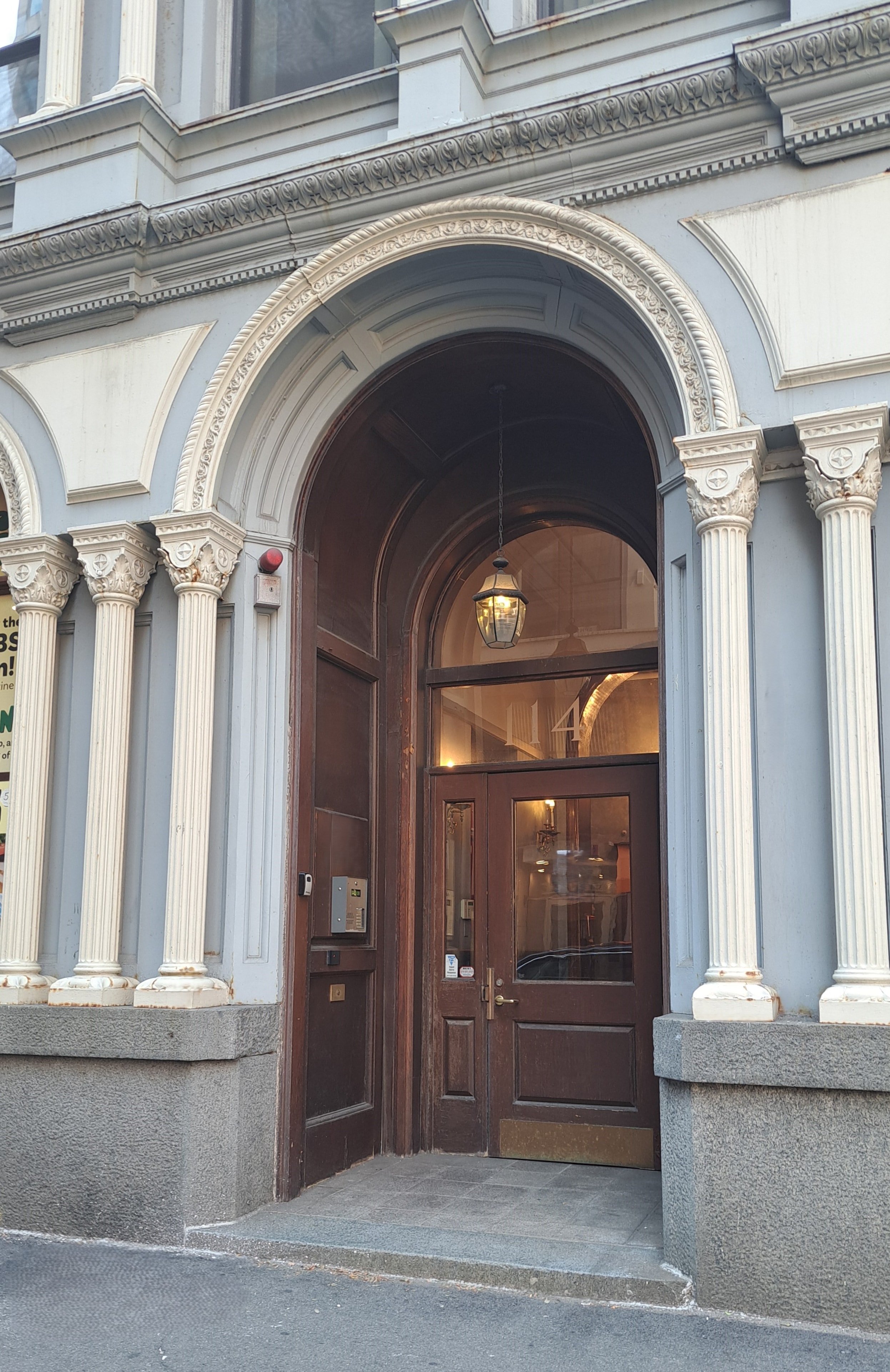 Arched entry with ornamental columns