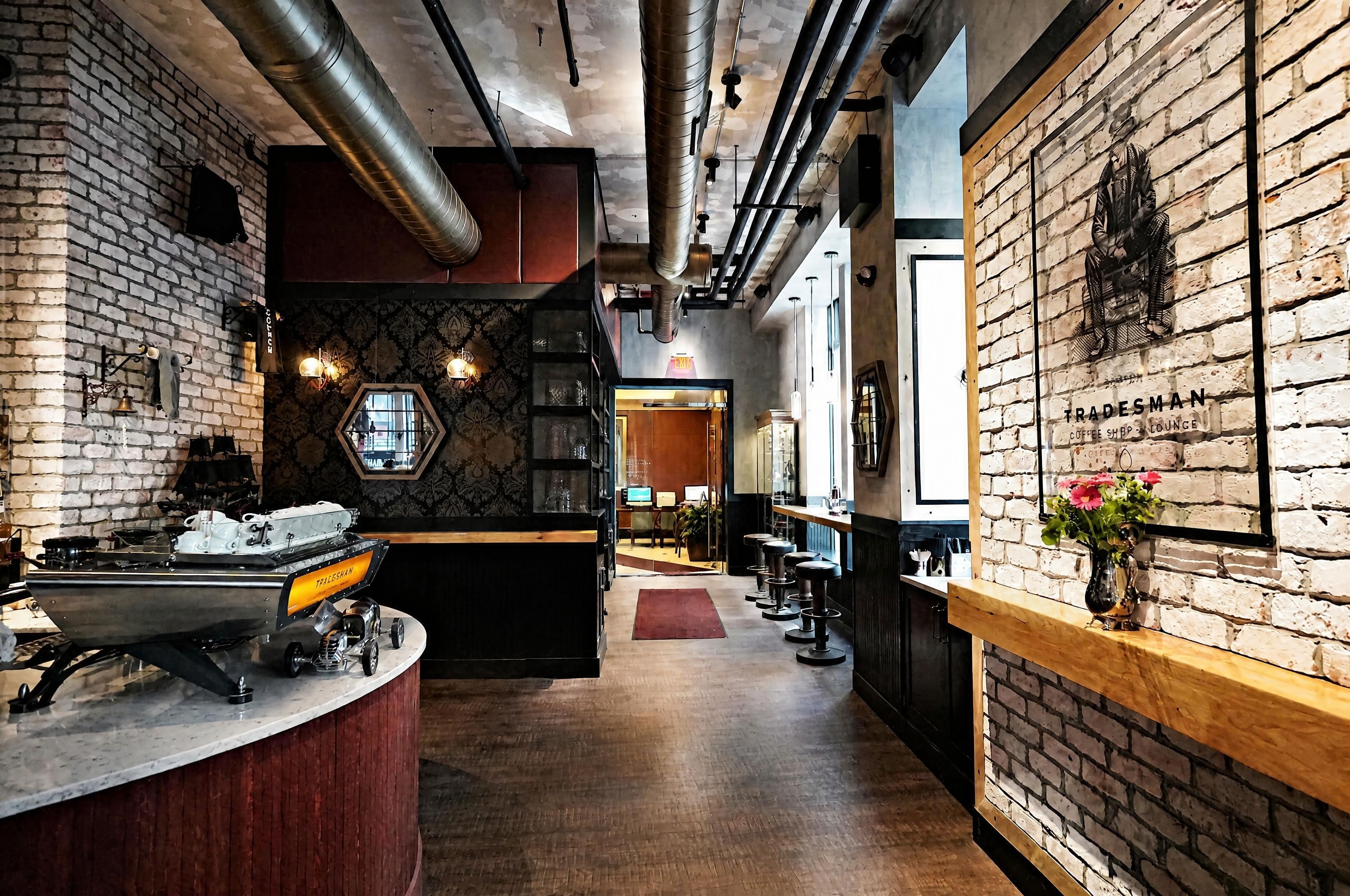Entry corridor with coffee roaster and branded signage